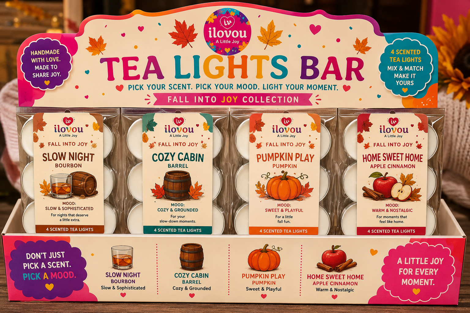 Fall Into Joy Tea Lights Bar display: Slow Night Bourbon, Cozy Cabin Barrel, Pumpkin Play, and Home Sweet Home Apple Cinnamon